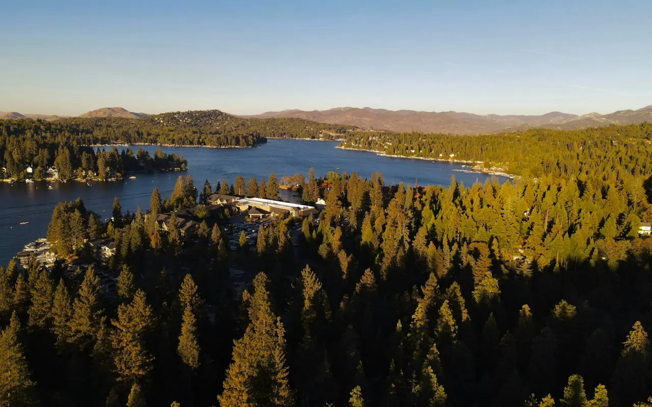 Aerial view of Lake Arrowhead and its forested shoreline