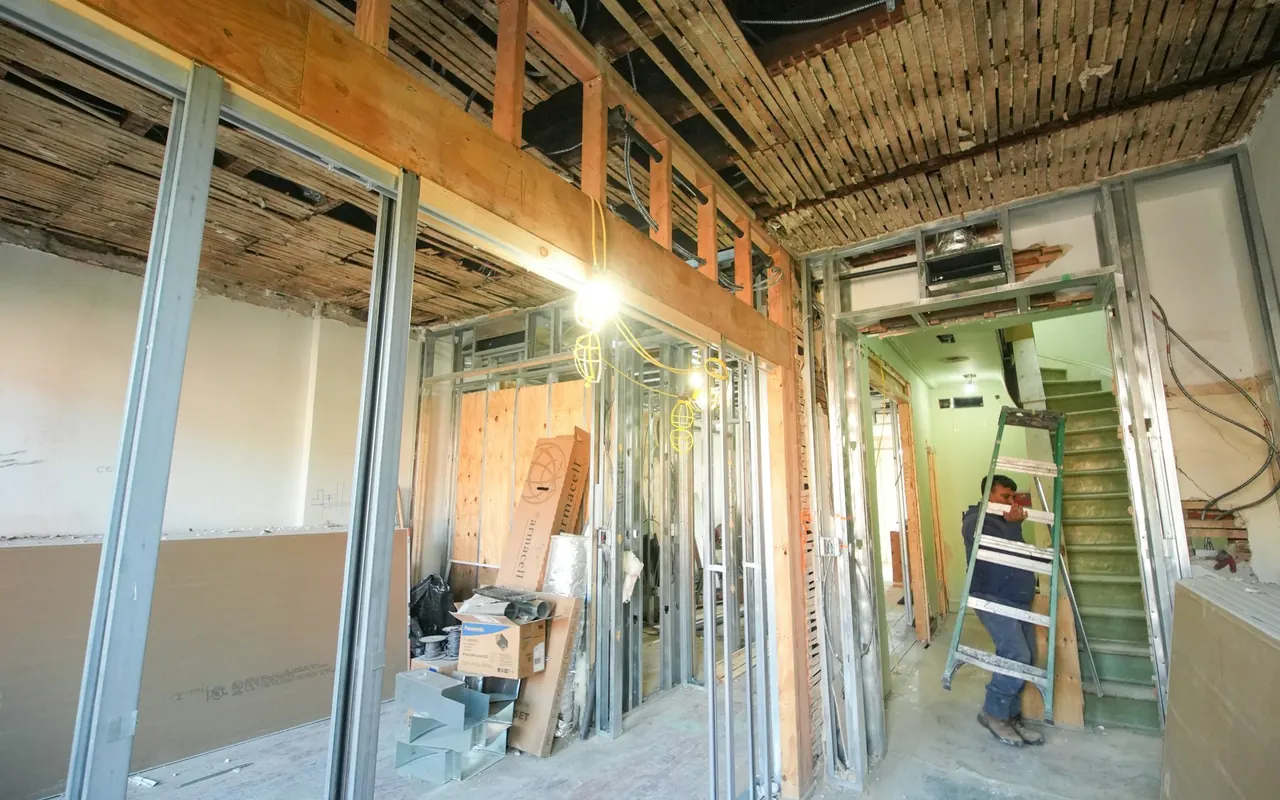 Interior renovation with exposed framing before finishes are installed